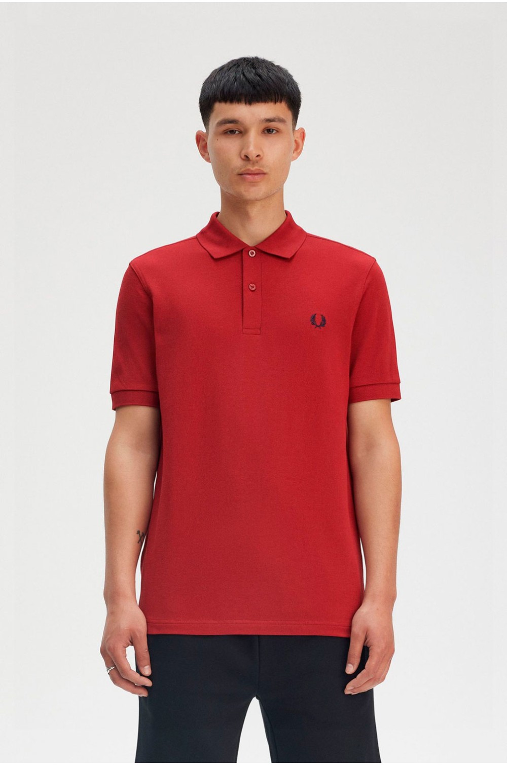 Fred Perry polo rojo tostado con manga corta