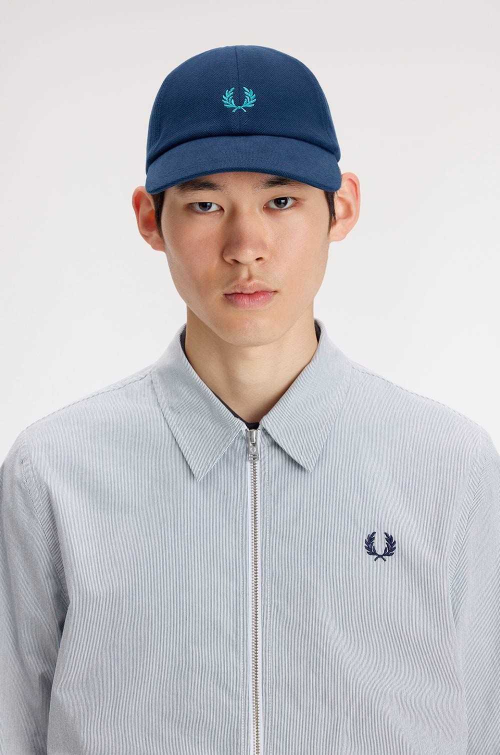 Gorra azul tenis Fred Perry corona laurel verde menta