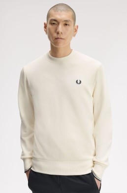 Detalle sudadera crudo con logo Fred Perry hombre