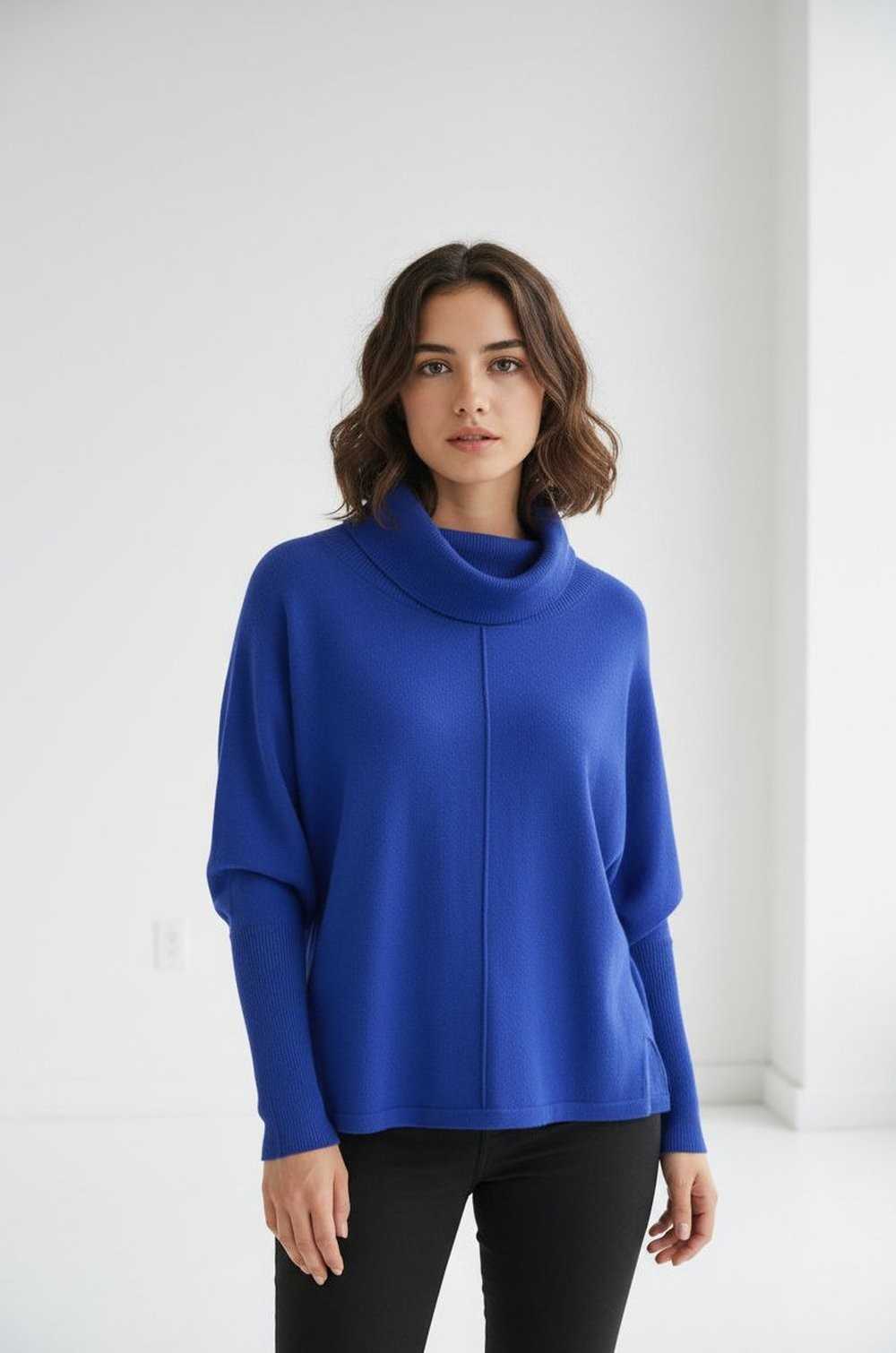 Jersey azul WNT de corte holgado con puños largos de canalé